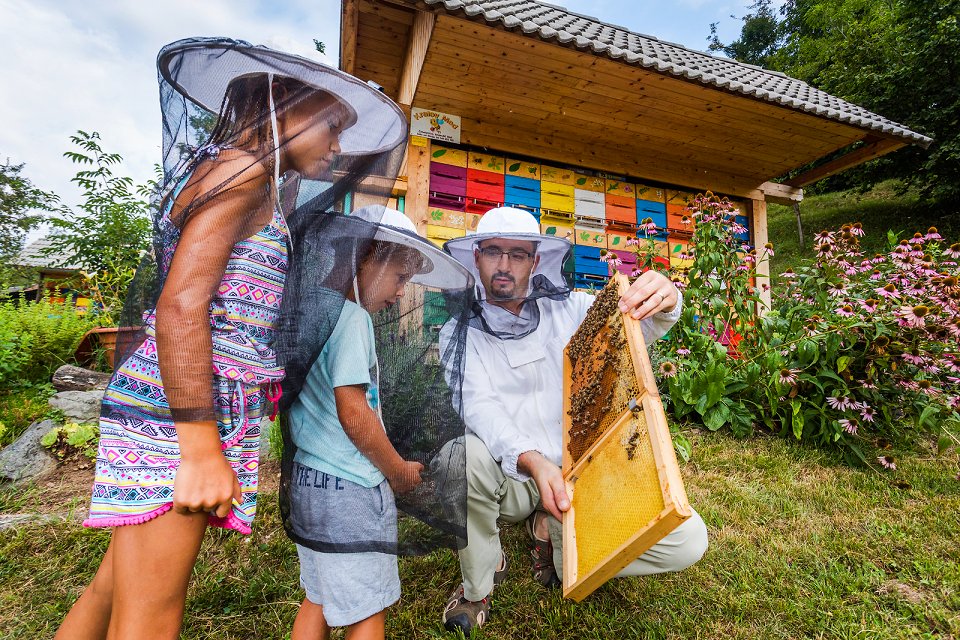 beekeeper and children beehive jost gantar